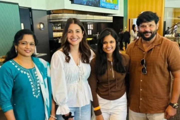 Anushka-Sharma-Poses-with-Nitish-Kumar-Reddys-Family-After-Boxing-Day-Test.webp.webp